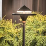 Beautiful outdoor garden decor featuring statues, planters, and unique art for a vibrant space.
