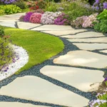 Beautiful DIY budget garden walkway made with affordable materials and creative designs.